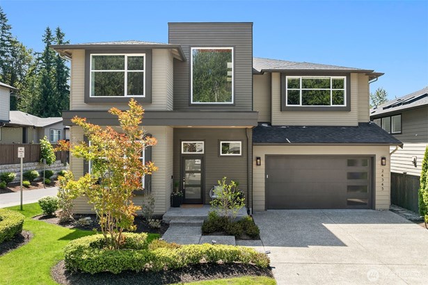 This stunning, better-than-new residence offers 5 spacious bedrooms and 4.5 beautifully appointed bathrooms