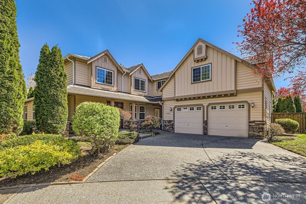 Timeless architectural charm harmonizes beautifully with modern elegance and thoughtful design in this two-story craftsman home.