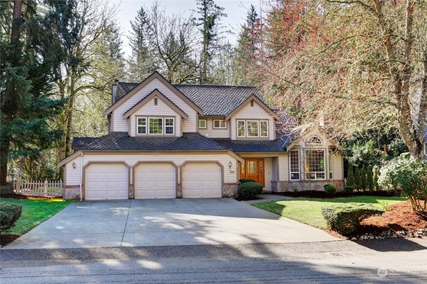 Located just moments from the shores of Lake Wilderness, nestled within the serene and picturesque community of Lake Forest Estates, this home offers an exceptional blend of comfort and natural beauty.