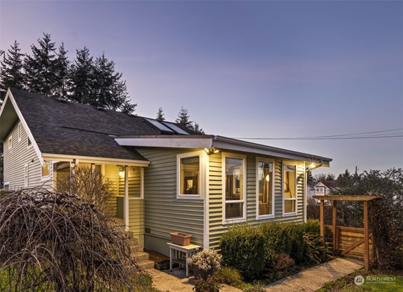 Remodeled 2-story charmer tucked away from the city in a private setting, yet walking distance to Rainier Beach Light Rail, parks, trails, waterfront.