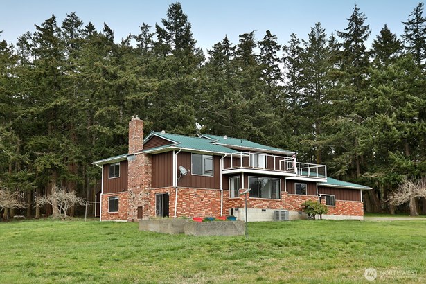This 3,015 sq. ft. home offers comfortable living spaces with stunning views.