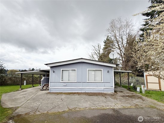 Unit 36, Tucked Away in the back of the neighborhood in a quiet cul-de-sac, with covered parking spaces on both sides