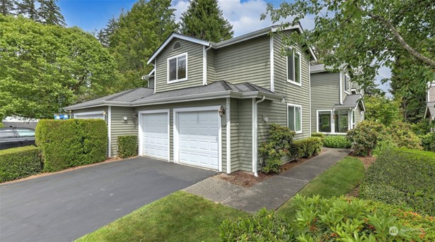 Move-in ready two story townhome and sizeable two-car garage.