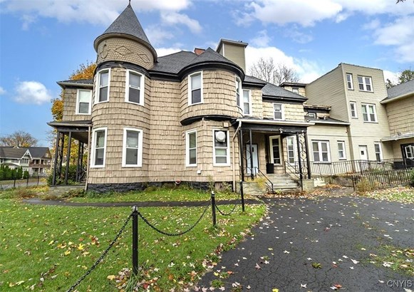 Front exterior w/ circular driveway