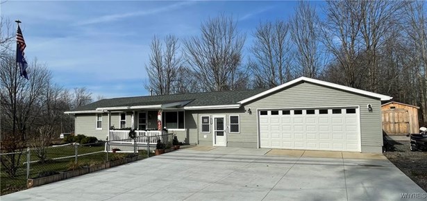 Front Exterior, oversized concrete driveway and sh