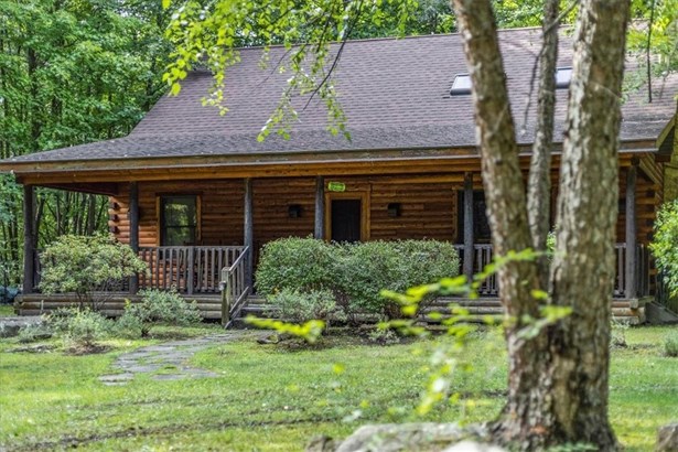 A wooded oasis welcomes you to this Cedar home!