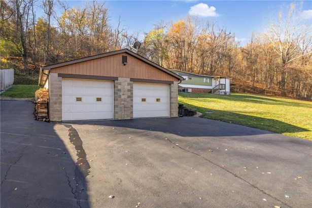 AWESOME 2 CAR GARAGE ON A BEAUTIFUL LOT, SECURITY,