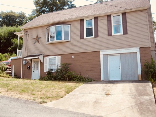 Front exterior with 2 car garage