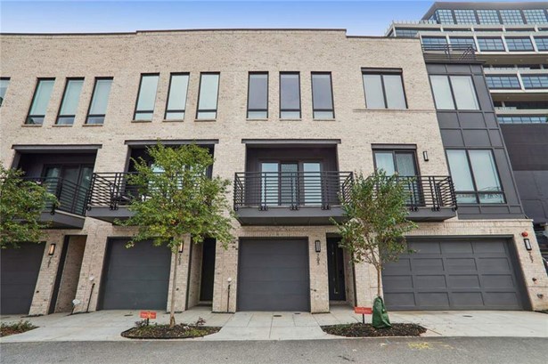 Stunning 3 story townhome with tons of natural light, 2 terraces, 10 ft ceilings.
