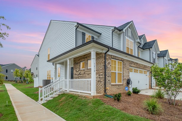 Exterior is partial brick and James Hardie plank siding