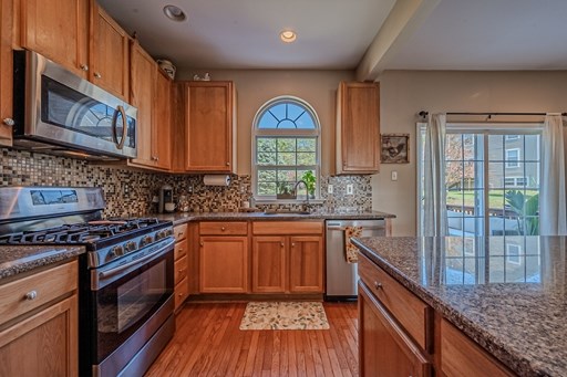 ...granite counters, tile backsplash...