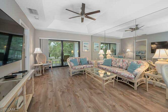 Open and bright living area with new luxury vinyl flooring