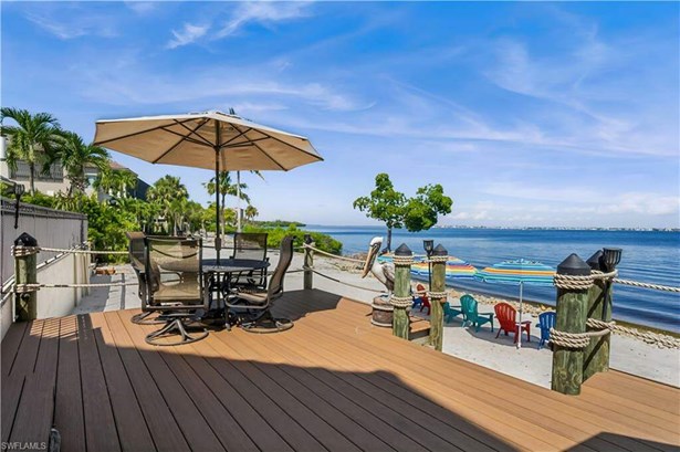 This amazing seating area is right off of the pool deck.  It is steps to your private beach area!