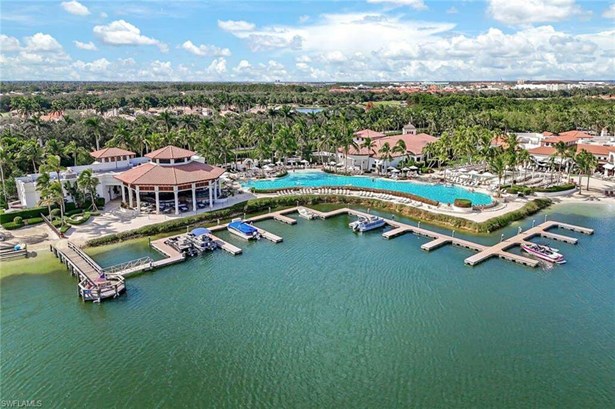 Bird's eye view of lake, clubhouse and pool